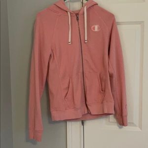Pink champion zip up sweatshirt.